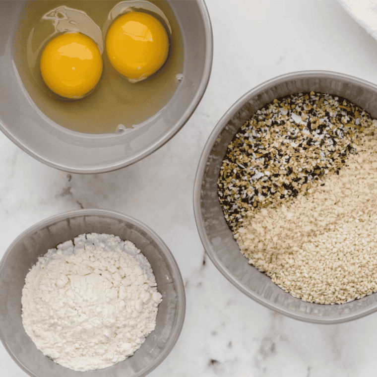 ripe avocado being sliced into wedges and peeled for avocado fries