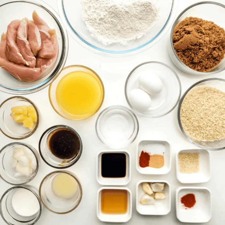 Ingredients for copycat Jack Daniel's chicken strips: chicken tenderloins, flour, panko, eggs, brown sugar, whiskey, and seasonings