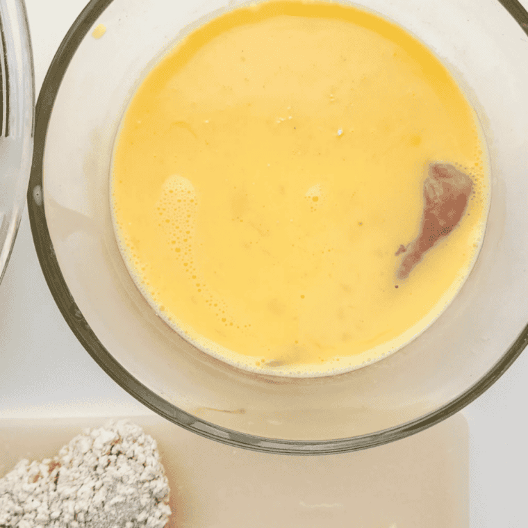 Pulsing pineapple, garlic, onion, and ginger in a blender for copycat Jack Daniel's chicken strips glaze.