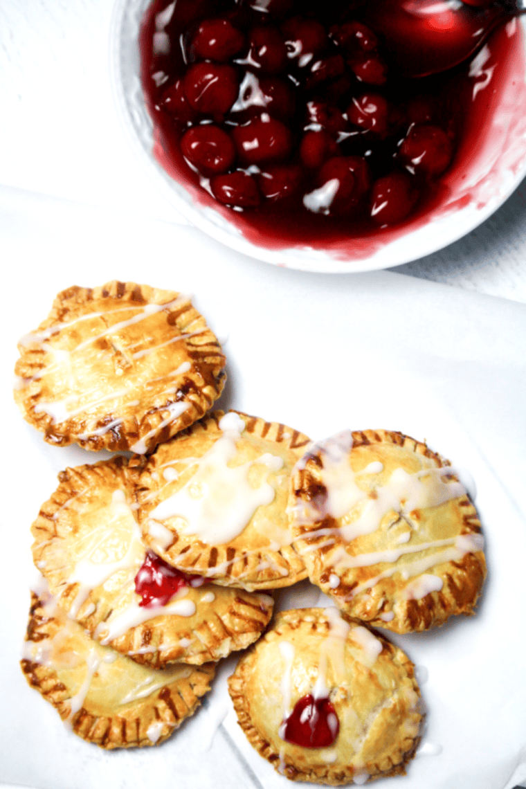 Golden air fryer cherry pie bombs with flaky crust and sweet cherry filling
