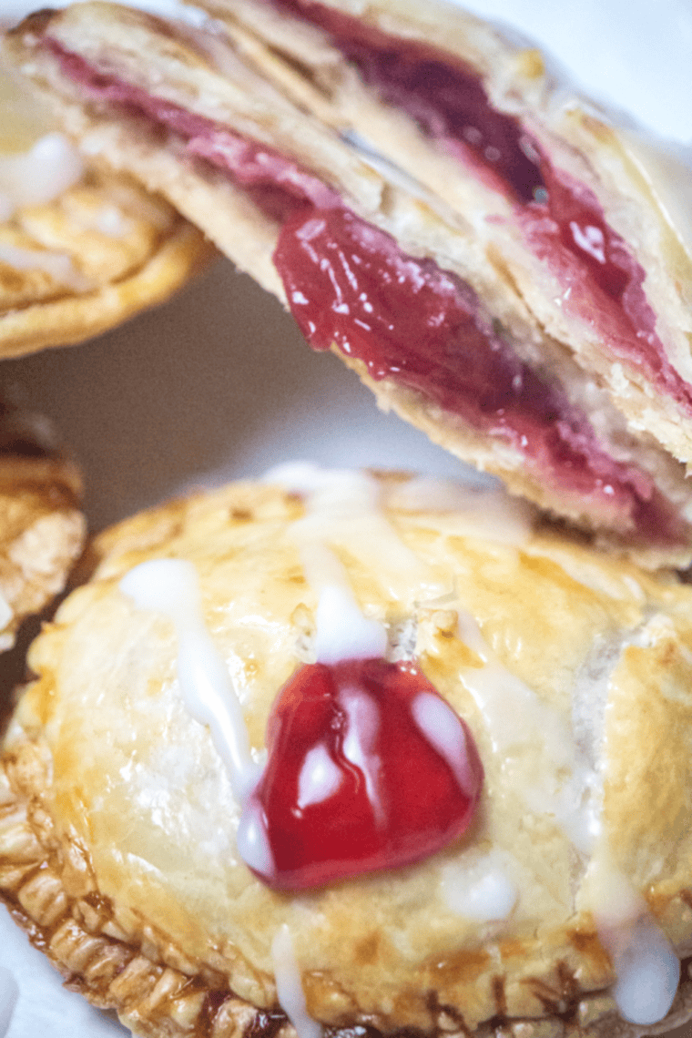 Golden air fryer cherry pie bombs with flaky crust and juicy cherry filling
