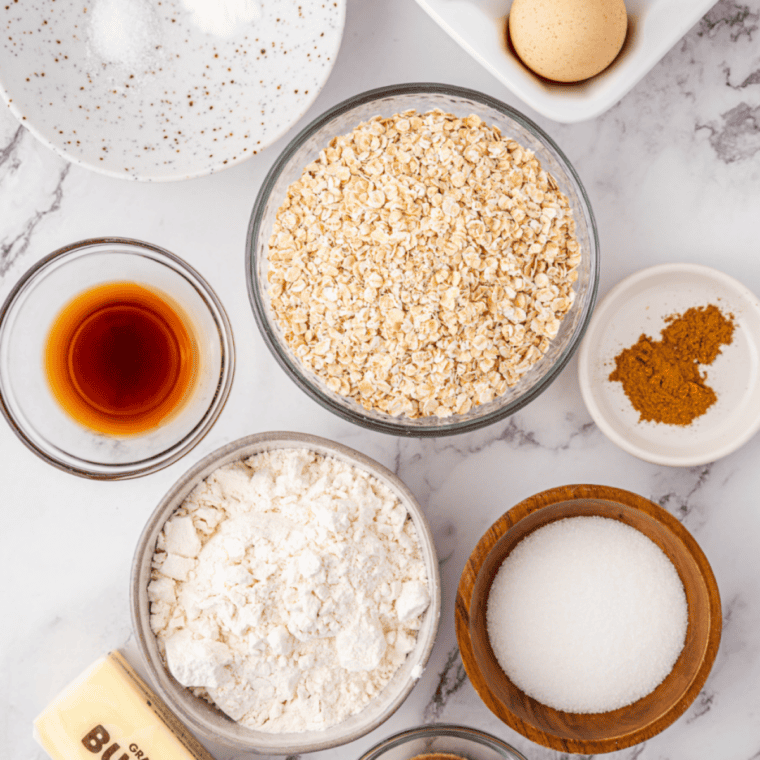 Ingredients needed for Air Fryer Copycat Crumbl Iced Oatmeal Cookies on kitchen table.