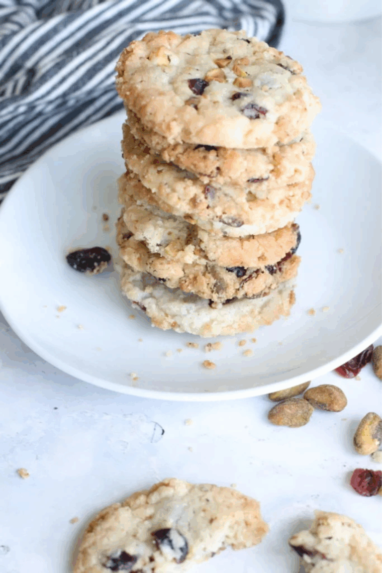 Golden-brown shortbread cookies studded with cranberries and pistachios fresh from the air fryer.