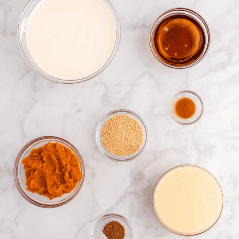 Ingredients for Ninja Creami pumpkin ice cream: pumpkin puree, heavy cream, milk, brown sugar and spices