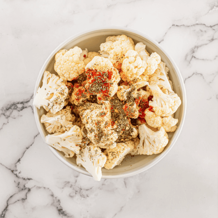 Season the frozen cauliflower.