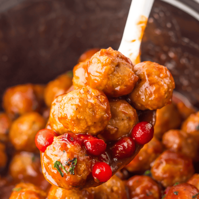 Slow cooker turkey meatballs simmering in marinara sauce
