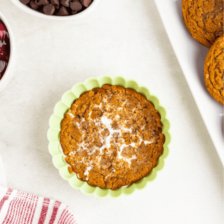 Pressed oatmeal cookie base in a ramekin ready for air frying