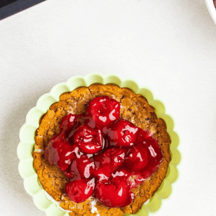 Cherry pie filling topped with oat crumble and chocolate chips before air frying