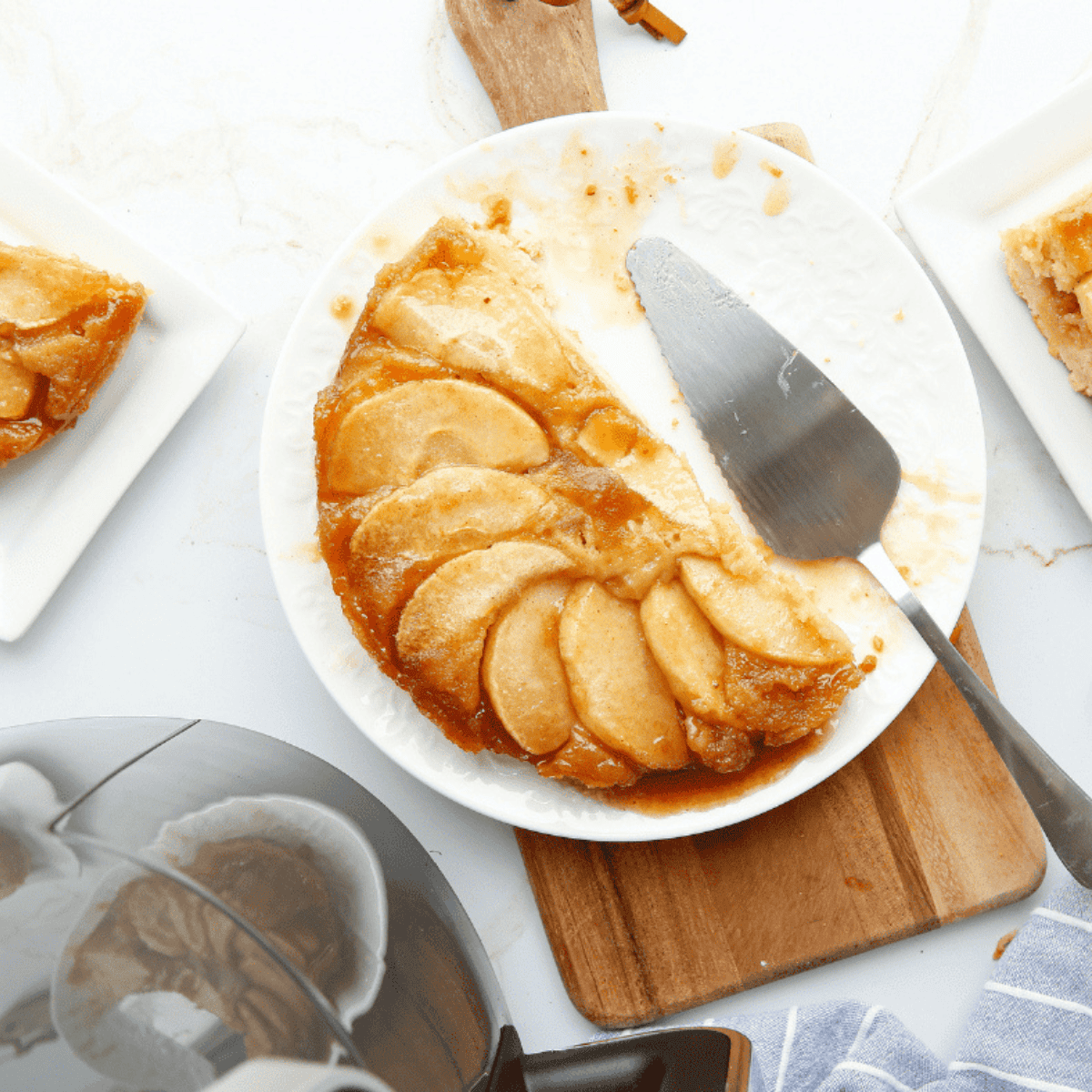 Slice of caramel apple upside down cake served on plate