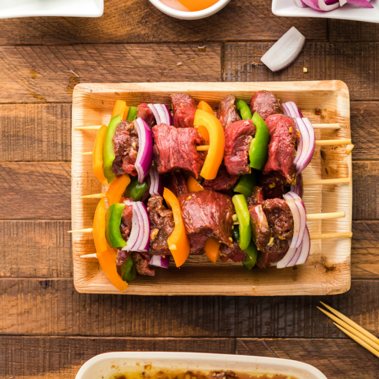 Marinated beef and bell peppers threaded onto kabob skewers.