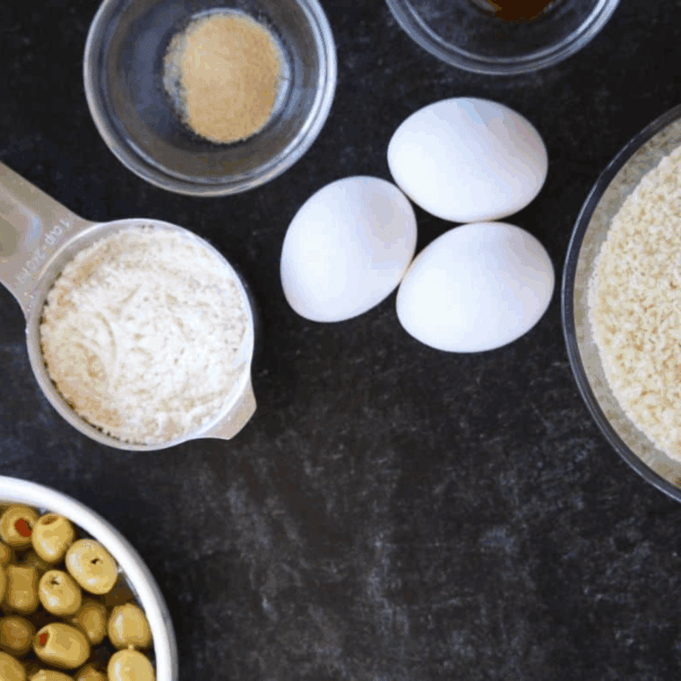 Ingredients needed for Easy Air Fryer Fried Olives on kitchen table.