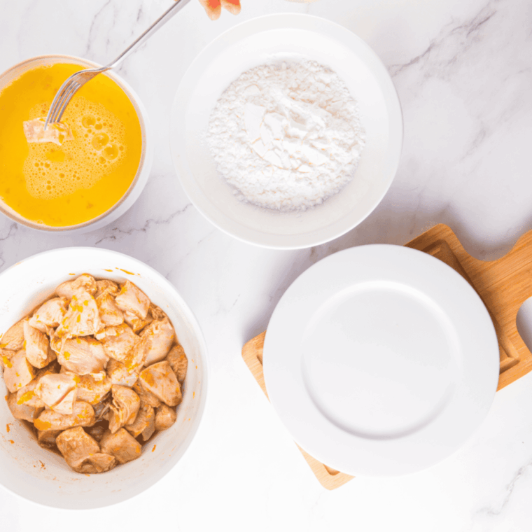 Air frying chicken in a single layer until golden and crispy