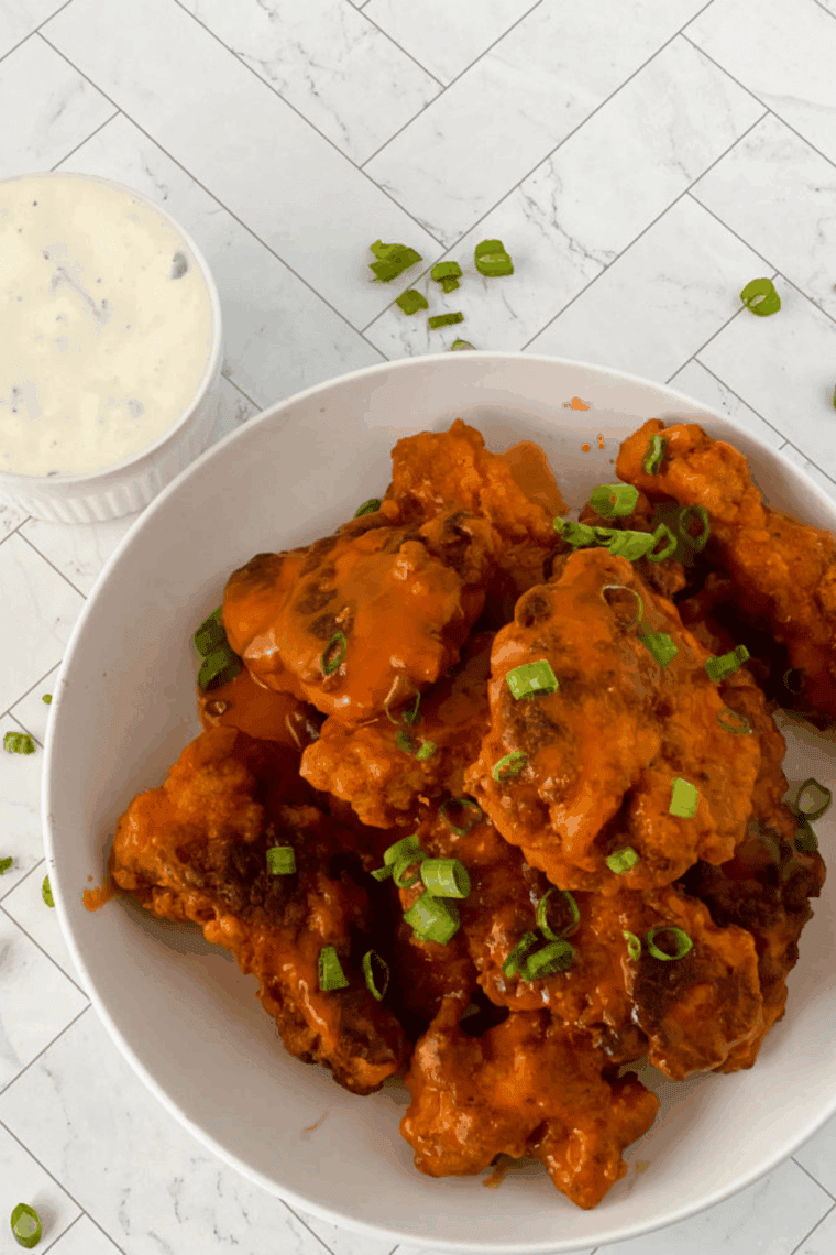 Crispy copycat Culver’s buffalo chicken tenders cooked in the air fryer and served hot with dipping sauce