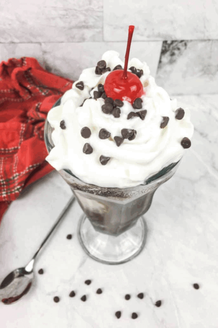 Frozen Ninja Creami Dr. Pepper cream soda in a pint container with smooth, creamy texture