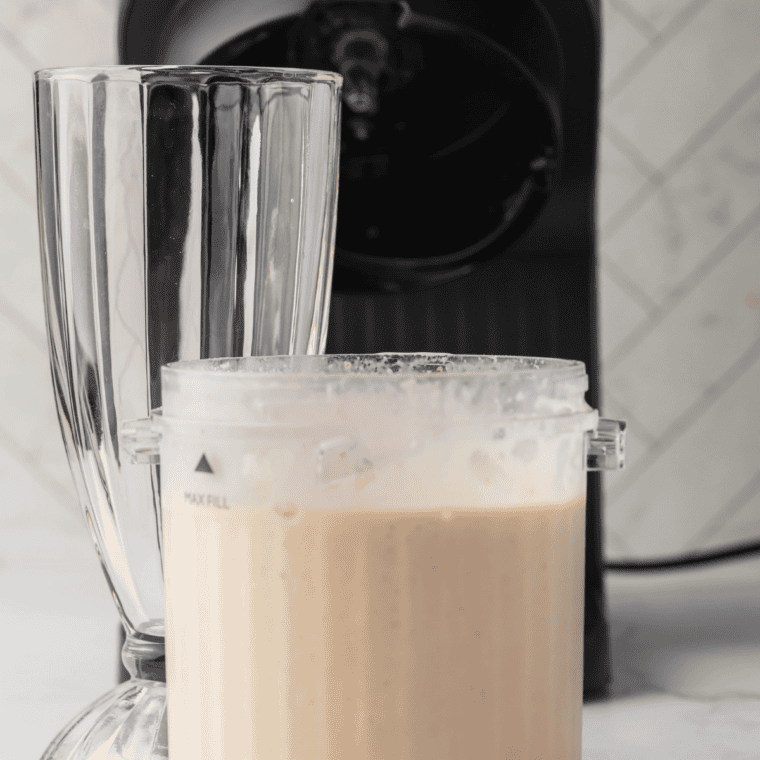 Vanilla ice cream, milk, and vanilla extract added to a Ninja Creami pint container