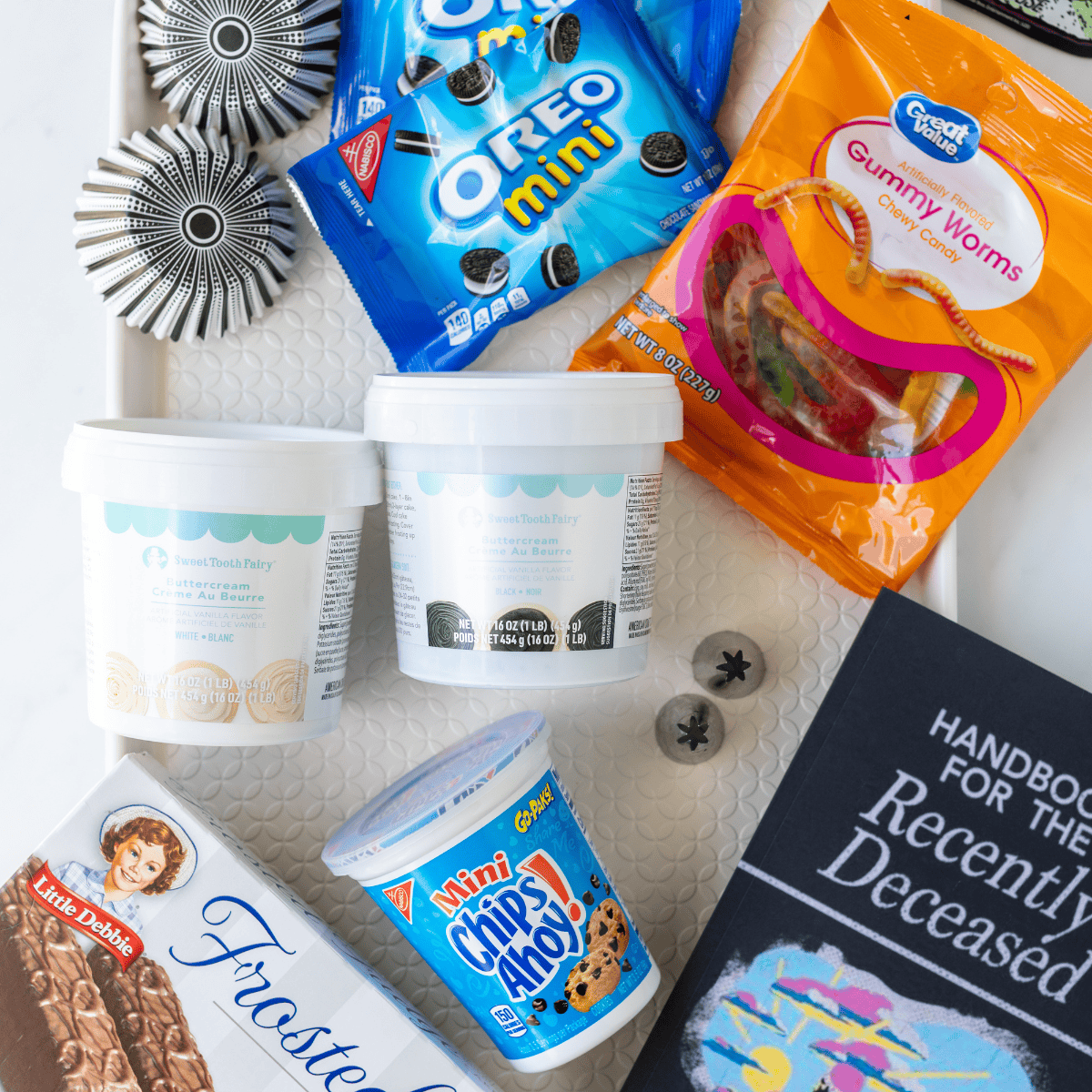 Ingredients needed for Beetlejuice Buttercream Board on kitchen table.