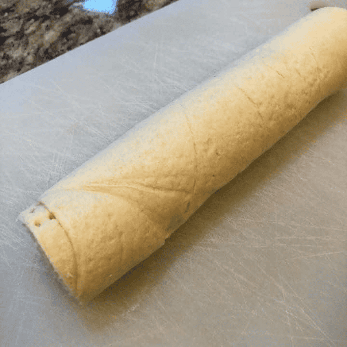 Ingredients needed for Easy Air Fryer Brie Bites on kitchen table.