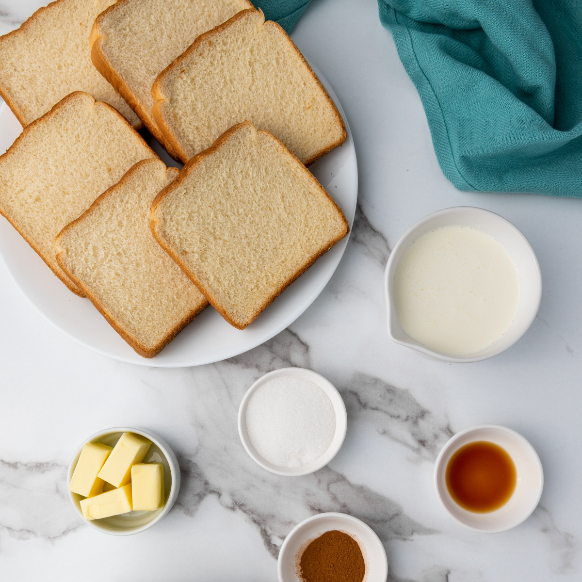 Ingredients needed for Easy Air Fryer Eggless French Toast on kitchen table.