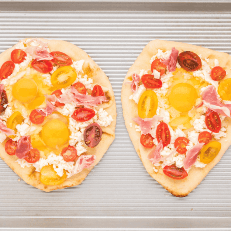 Add toppings to you breakfast pizza.