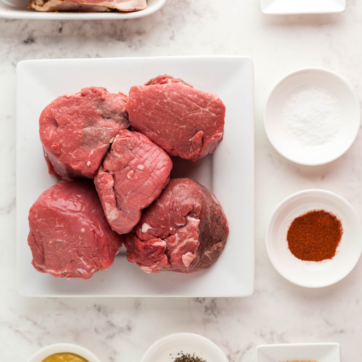 Ingredients needed for Blackstone Filet Mignon (Juicy & Easy) on kitchen table.