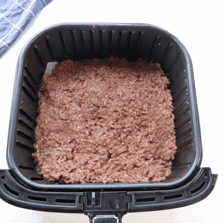 Preheating air fryer to 375°F while forming small, thin beef patties for sliders