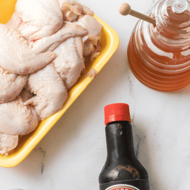 Ingredients needed for Easy Copycat Wingstop Cajun Chicken Wings on kitchen table.