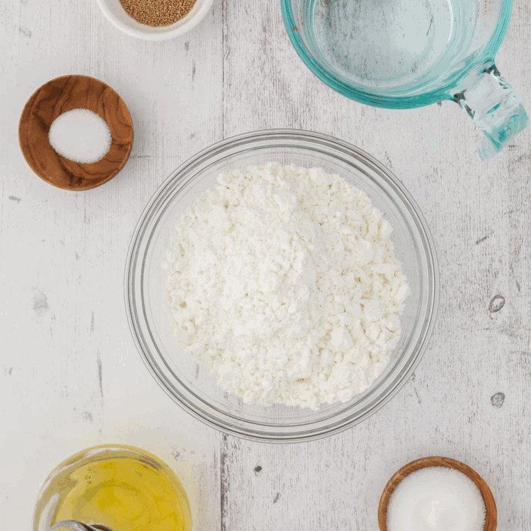 Copycat Homemade Bojangles Biscuits Recipe ingredients on kitchen table.