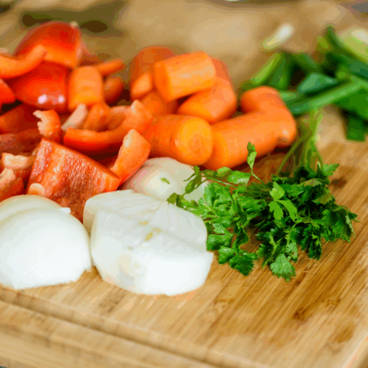 Ingredients needed for Cajun Jambalaya Pasta Recipe (Cheesecake Factory Copycat) on kitchen table.