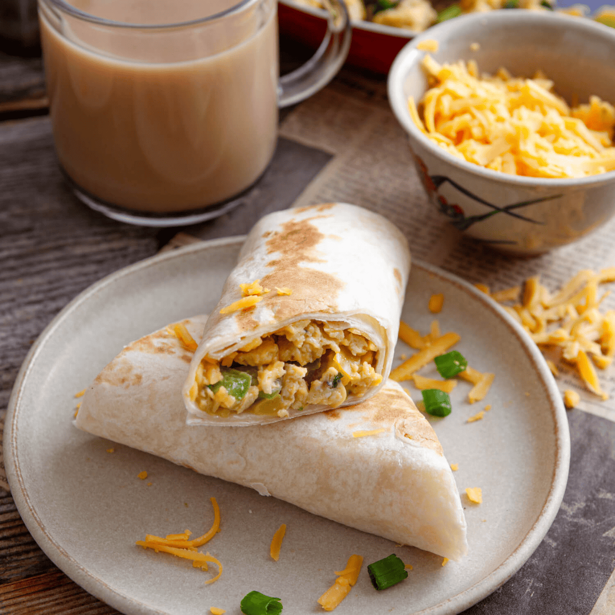 Copycat McDonald's breakfast sauce served next to a breakfast sandwich on a wood board