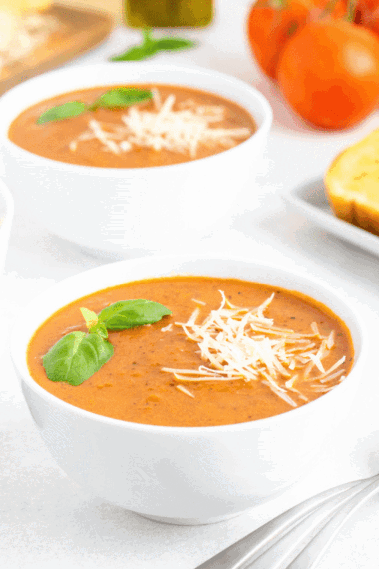 Bowl of Easy Air Fryer Tomato Soup on kitchen table.