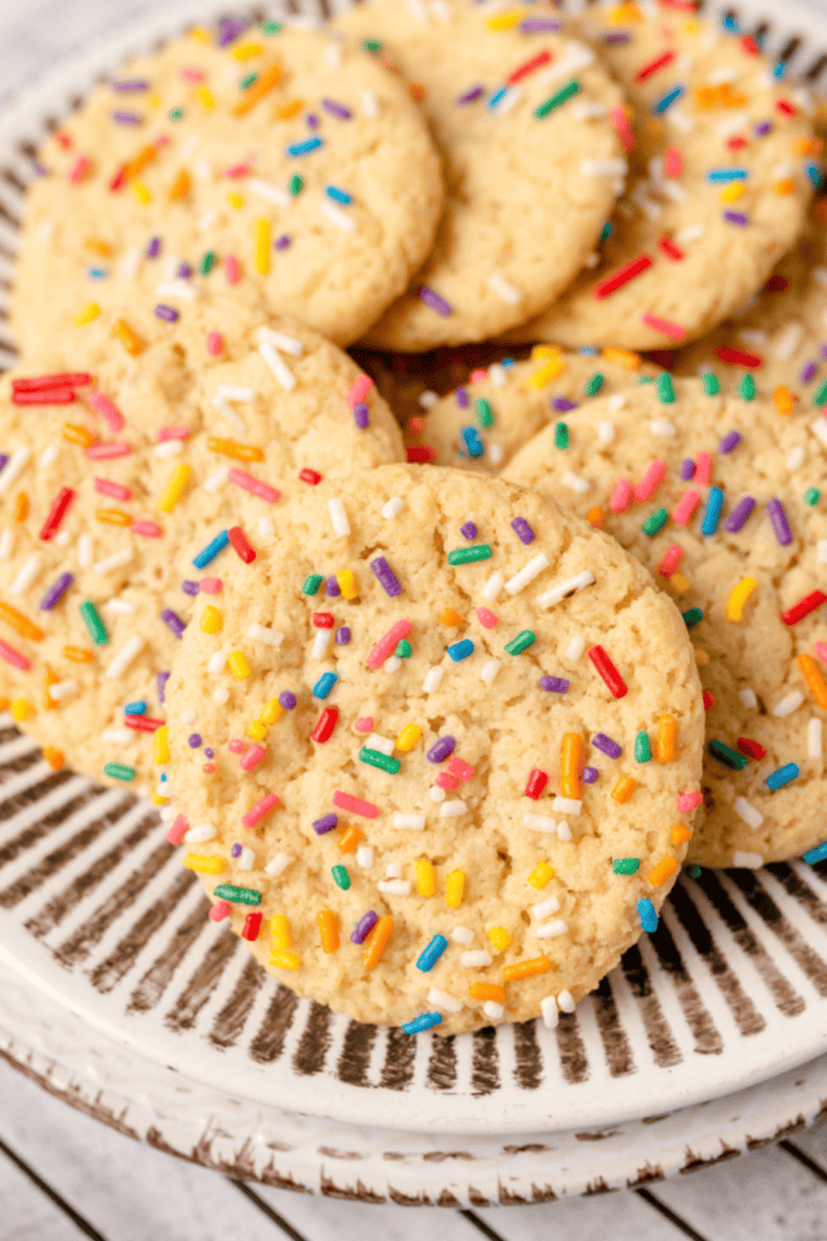 Three-ingredient Air Fryer Cake Mix Cookies cooling on a wire rack, golden and soft