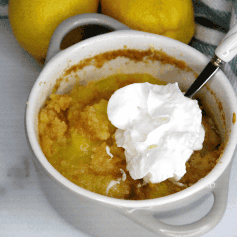 Air fryer lemon dump cake made with lemon pie filling, cake mix, and butter in a baking dish