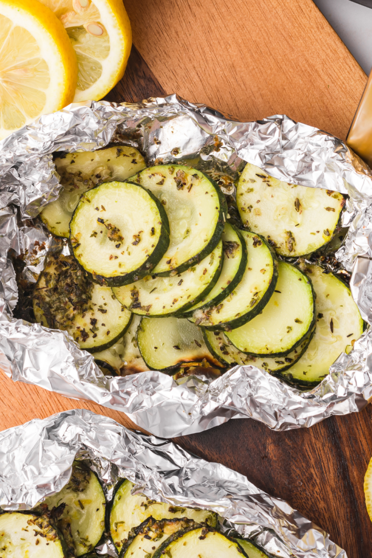 Zucchini cooked on Blackstone griddle until tender and lightly charred with golden edges for quick easy side dish