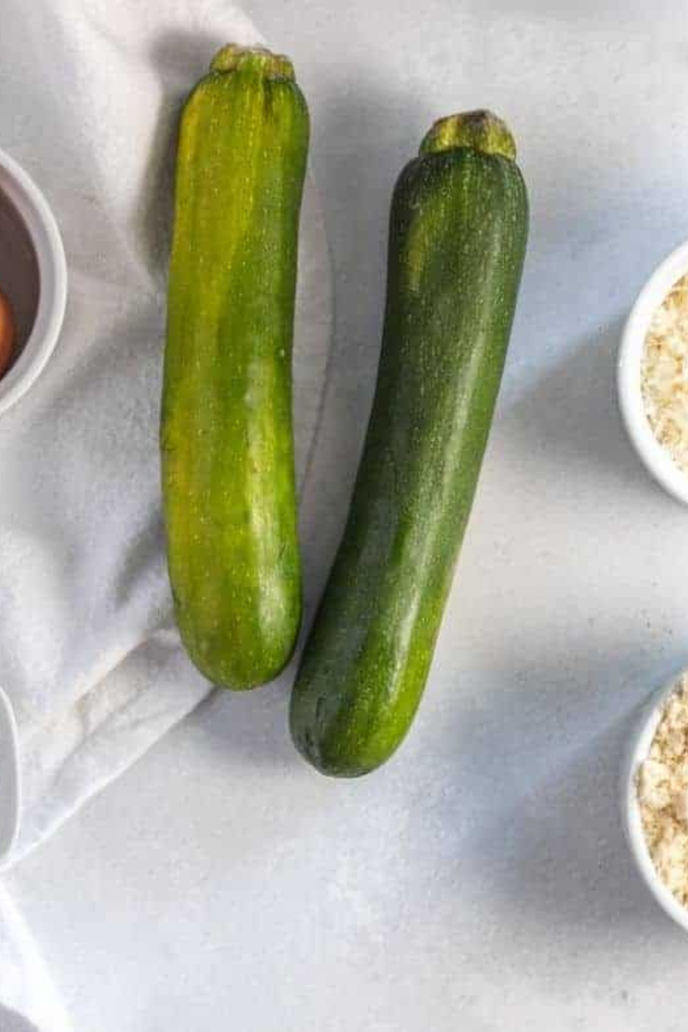 Ingredients needed for Blackstone Griddle Zucchini (Easy, Charred, Ready in 8 Minutes!) on kitchen table.