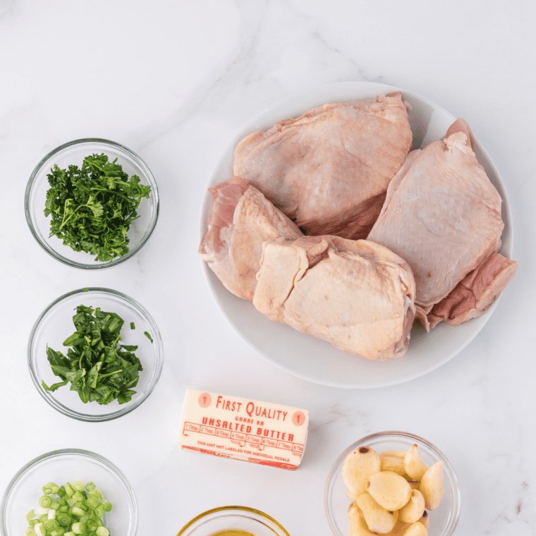 Ingredients needed for Ninja Foodi Grill Bone-In Juicy Chicken Thighs on kitchen table.