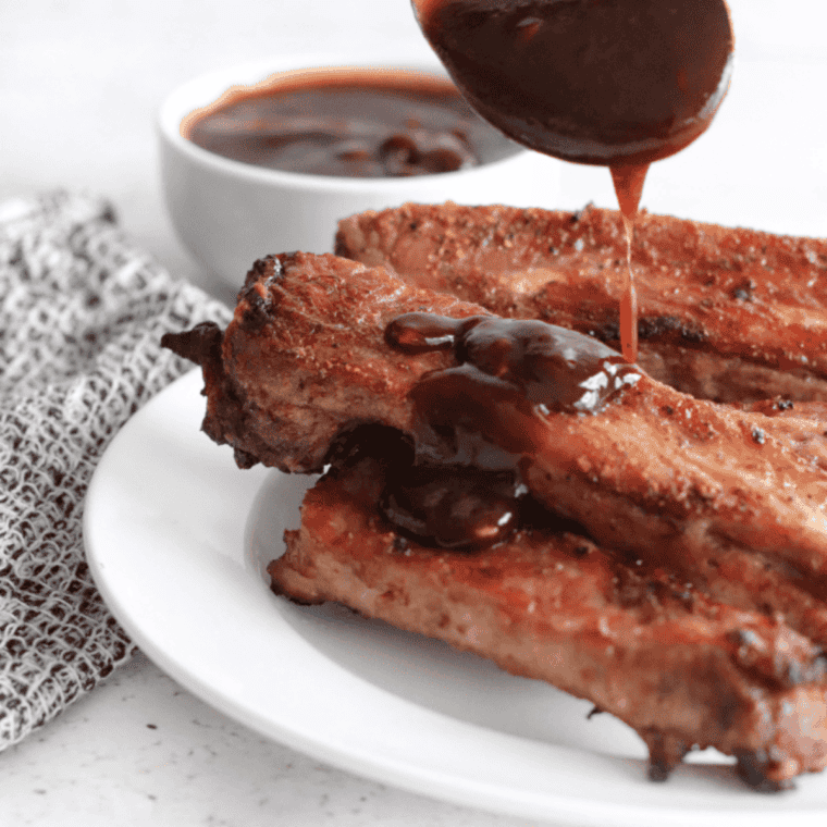 Drizzle The Best Whiskey Peach BBQ Sauce Recipe over ribs.