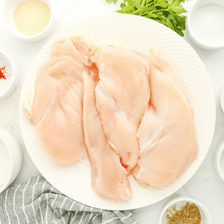 Ingredients for air fryer thin chicken breast: thin chicken breasts, olive oil, kosher salt, black pepper, and seasonings