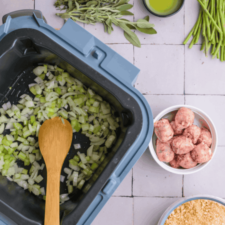 Saut&eacute;ing diced celery and onions in olive oil at high heat on the Ninja Speedi