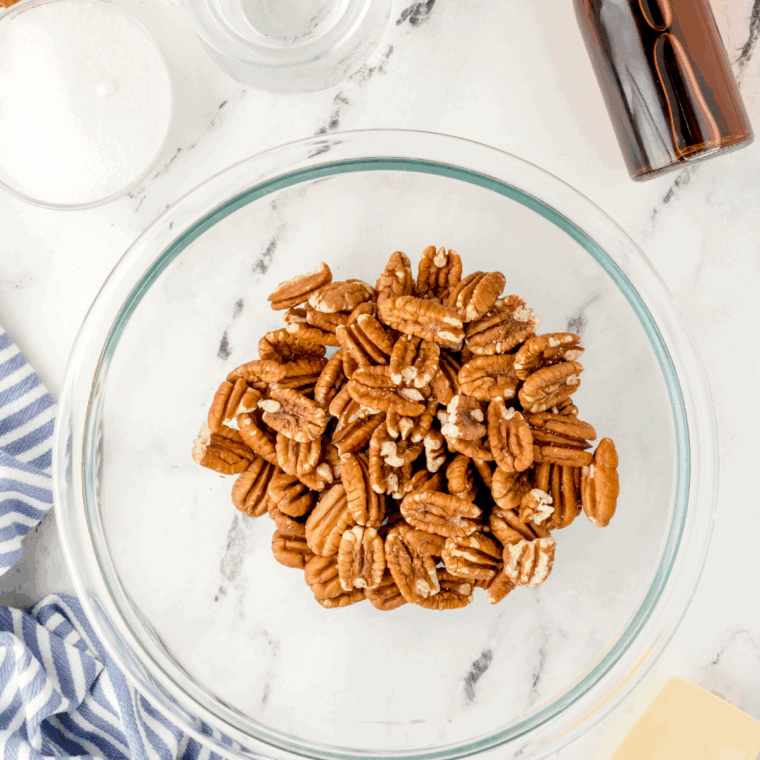Ingredients needed for Easy Air Fryer Gingerbread Candied Pecans on kitchen table.