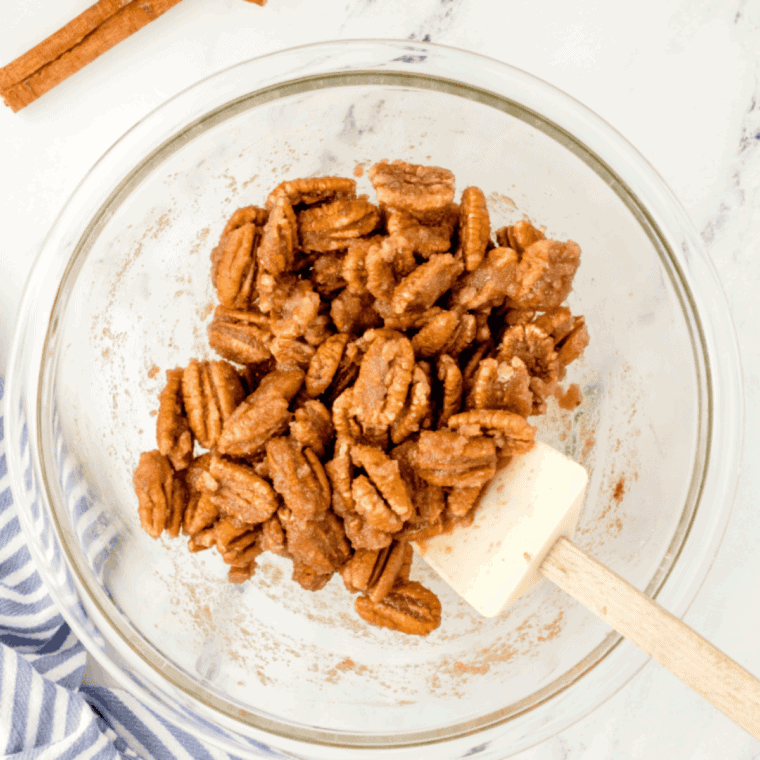 Air fryer preheating to 300°F, preparing for roasted pecans.