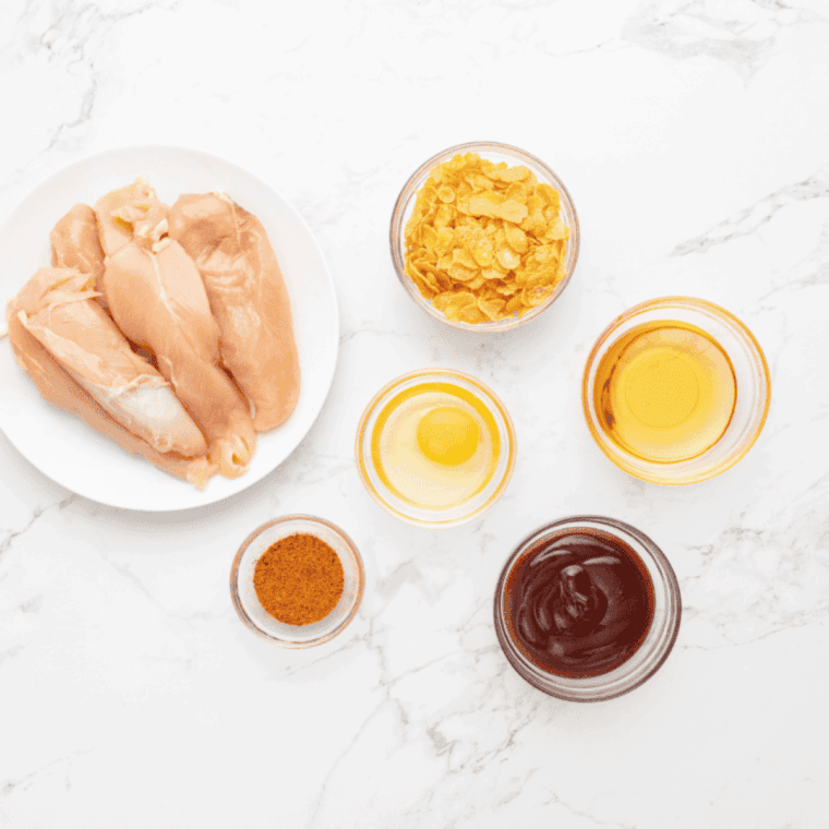 Ingredients needed for Copycat Dairy Queen Honey BBQ Chicken Strips Recipe on kitchen table.