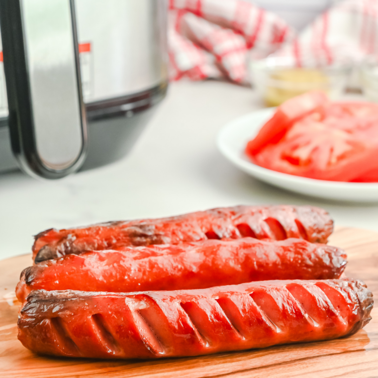 Layer toppings carefully to build a balanced, classic Chicago hot dog.