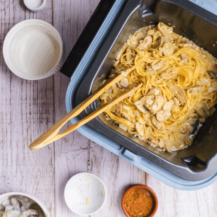 Cooking Cajun chicken linguini Alfredo in the Ninja Speedi at 375&deg;F, stirring frequently