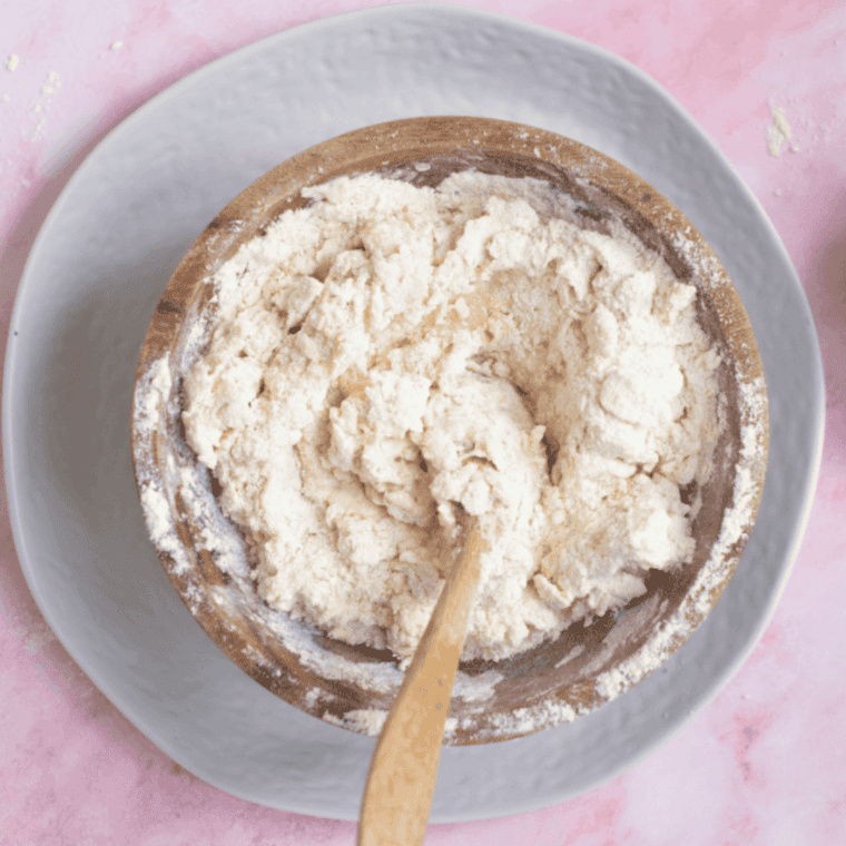 Mixing all-purpose flour, sugar, baking powder, and salt in a large bowl.