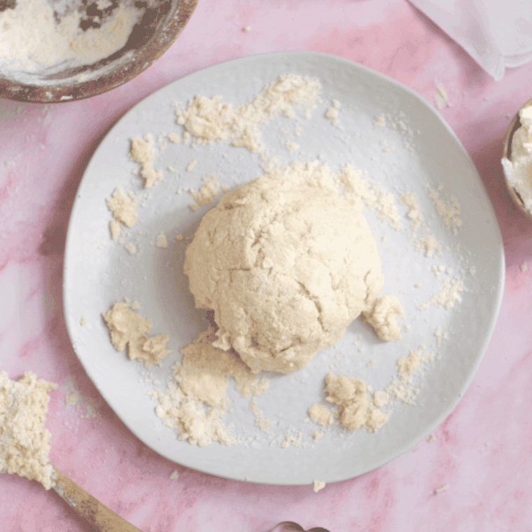 Cut cold butter into small cubes and blend into flour until crumbly.