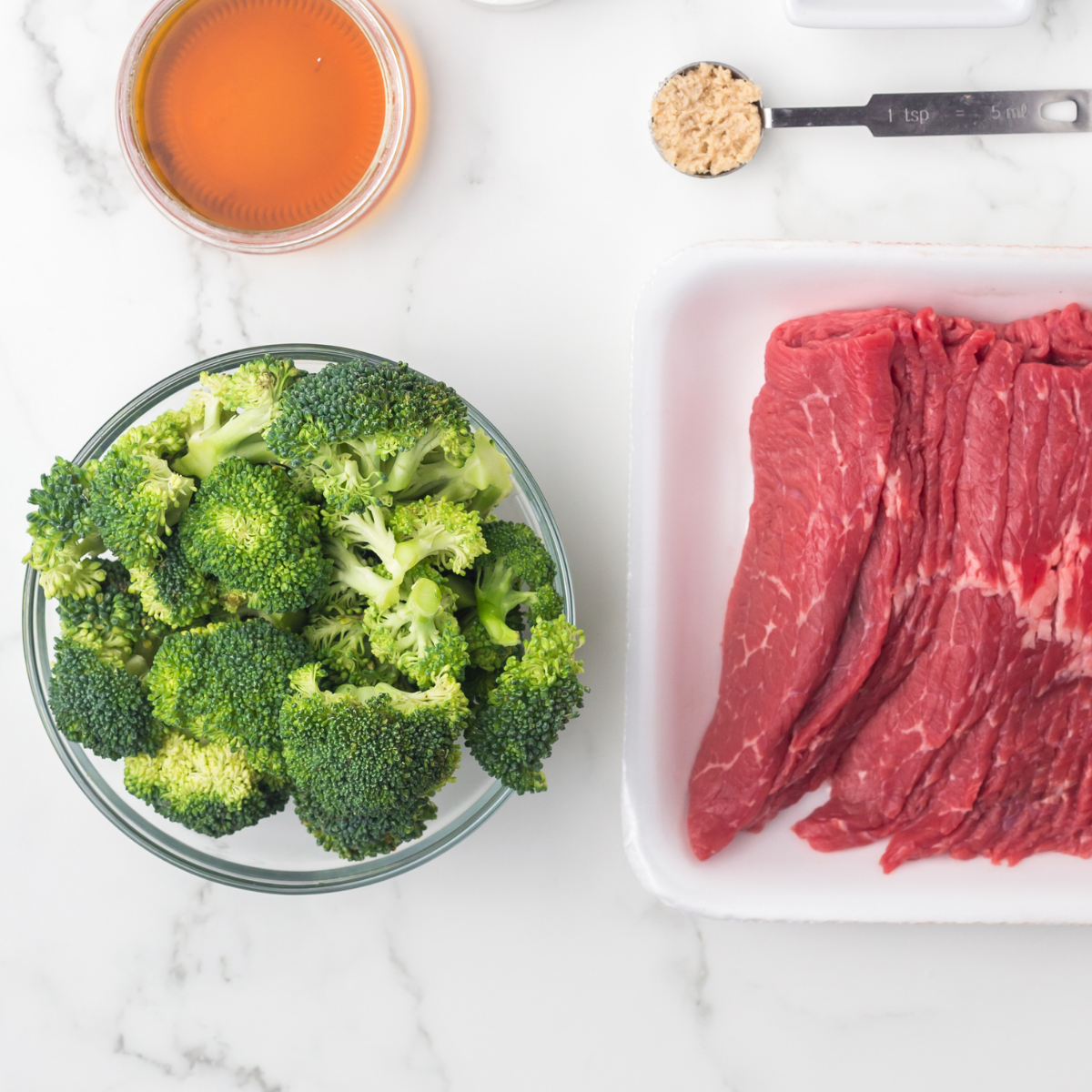 Ingredients needed for Blackstone Broccoli Recipe on kitchen table.