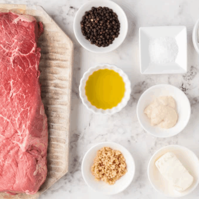 Ingredients needed for Easy Air Fryer Blue Cheese Stuffed Flank Steak on kitchen table.
