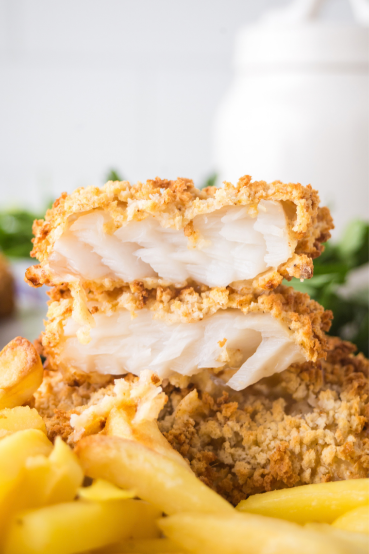 Golden baked fish fresh from the oven, flaking easily with a fork