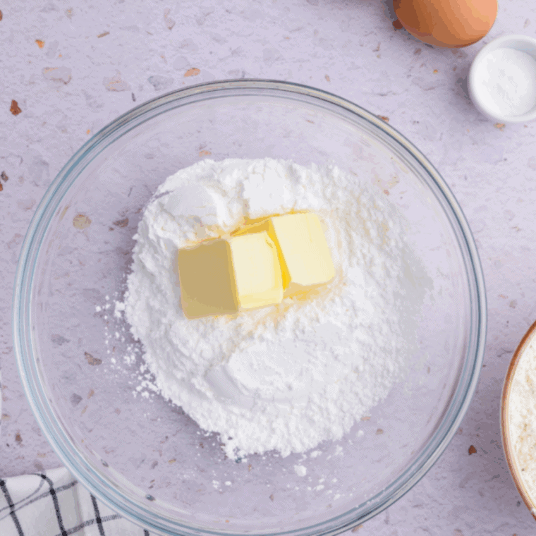 Mixing dry ingredients in one bowl and wet banana mixture in another before combining for banana bread batter