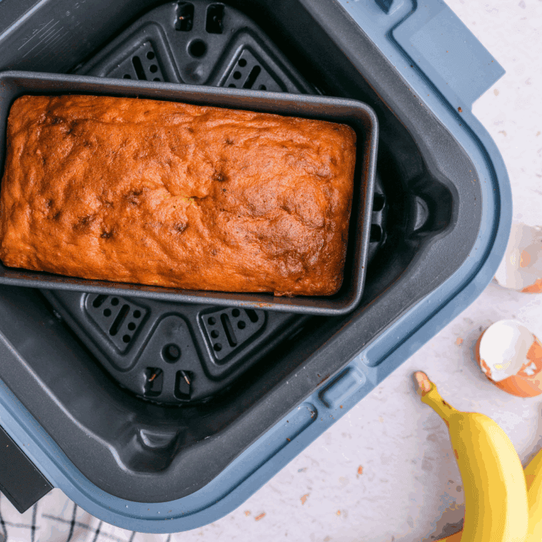 Cooked Banana Bread in the air fryer basket.